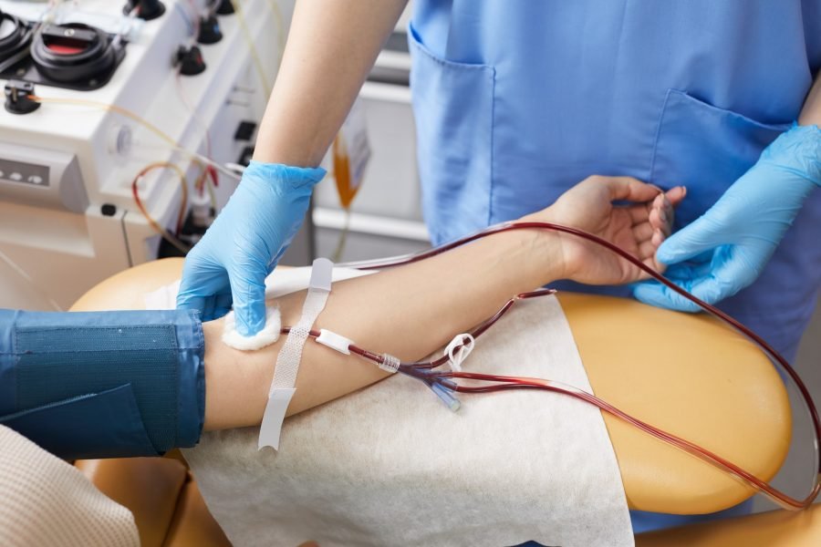 Doctor taking blood samples